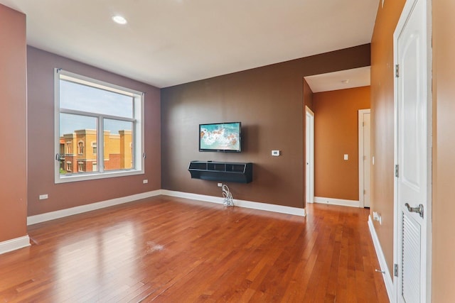 1200 N Foxdale Dr Unit 312, Addison, IL 60101 - spare room with hardwood / wood-style flooring and recessed lighting