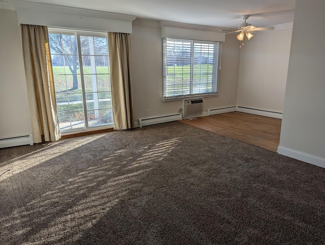 704 Kiwanis Dr Unit 1, Freeport, IL 61032 - empty room with baseboard heating, crown molding, healthy amount of natural light, carpet, and ceiling fan