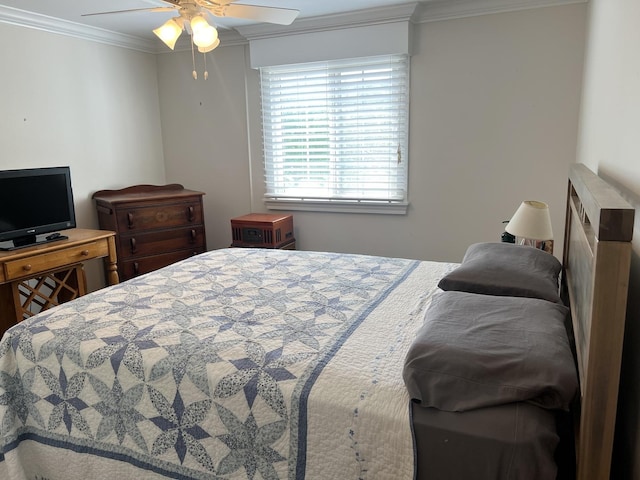 704 Kiwanis Dr Unit 1, Freeport, IL 61032 - bedroom featuring crown molding and a ceiling fan