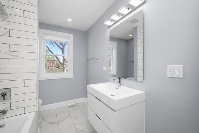 536 E 155th St, Phoenix, IL 60426 - bathroom featuring marble look tiles, vanity, recessed lighting, and shower / tub combination