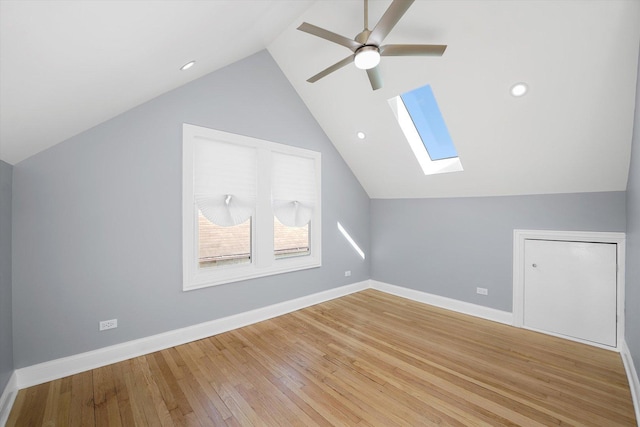 536 E 155th St, Phoenix, IL 60426 - bonus room featuring a skylight, lofted ceiling, ceiling fan, and light wood-style floors