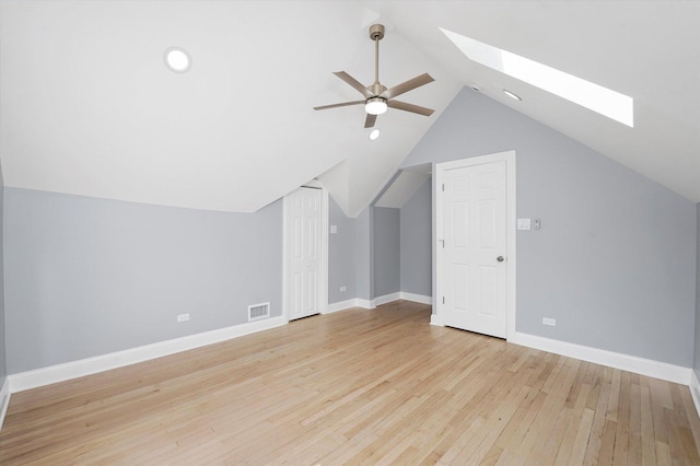 536 E 155th St, Phoenix, IL 60426 - bonus room featuring a skylight, lofted ceiling, light wood finished floors, and ceiling fan