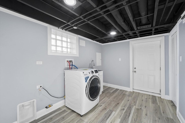 536 E 155th St, Phoenix, IL 60426 - laundry room with washer / clothes dryer and light wood-type flooring