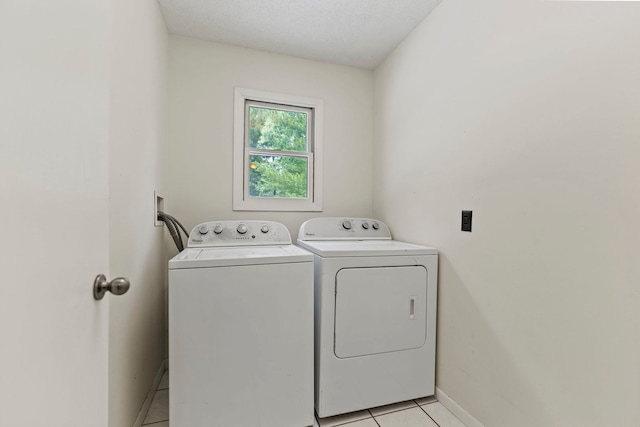 4293 W Rockton Rd, Rockton, IL 61072 - laundry room with washing machine and clothes dryer and light tile patterned flooring