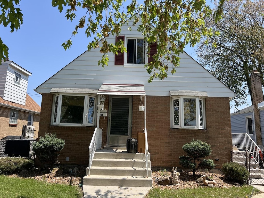 6145 S Nagle Ave, Chicago, IL 60638 - bungalow-style house featuring brick siding