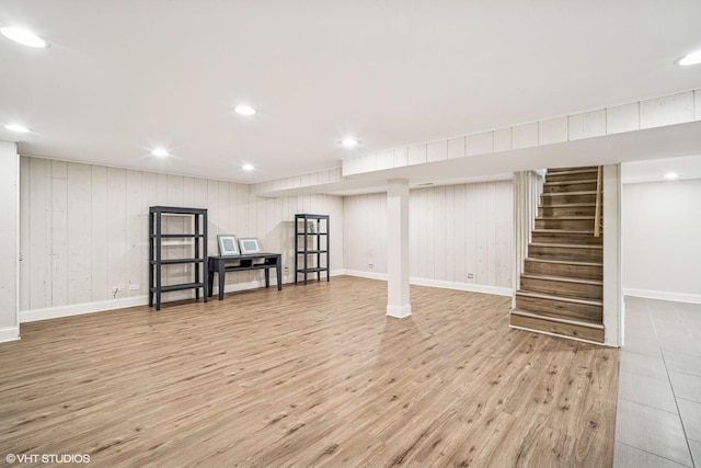 630 Wesley Dr, Park Ridge, IL 60068 - finished below grade area with light wood-type flooring, stairs, recessed lighting, and wood walls