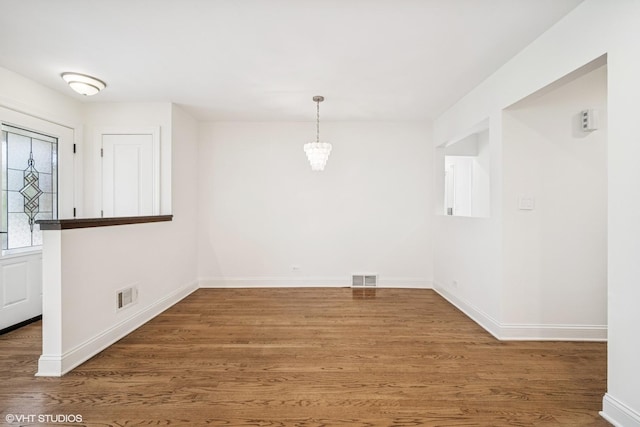 630 Wesley Dr, Park Ridge, IL 60068 - unfurnished dining area featuring wood finished floors and baseboards
