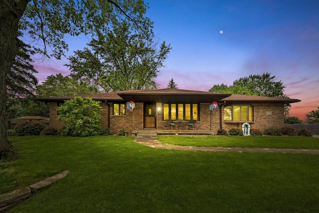 8950 S 84th Ave, Hickory Hills, IL 60457 - ranch-style home featuring a front yard, brick siding, and a porch