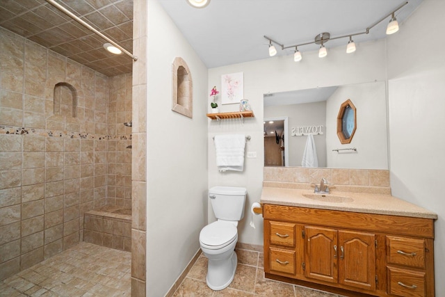 8950 S 84th Ave, Hickory Hills, IL 60457 - bathroom featuring vanity, tiled shower, and tile patterned flooring