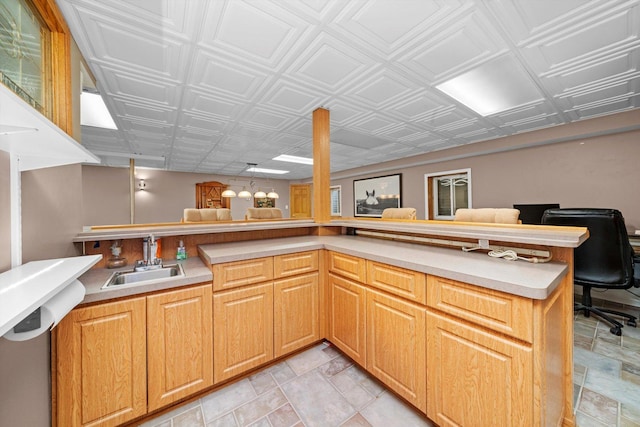 8950 S 84th Ave, Hickory Hills, IL 60457 - kitchen with light countertops, an ornate ceiling, open floor plan, and light stone finish flooring