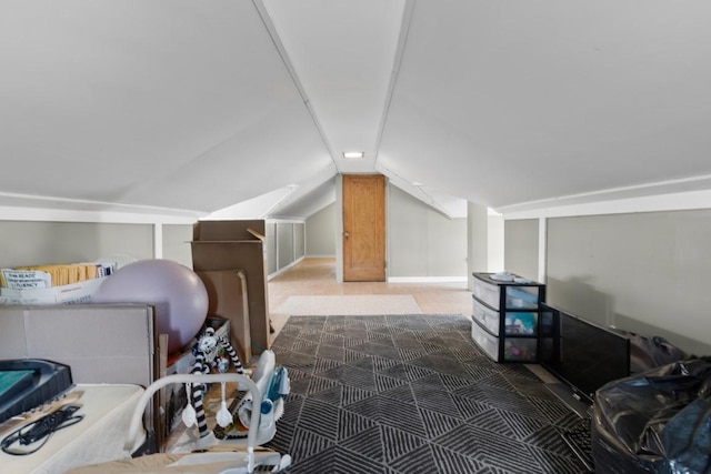 2417 Crosby St, Rockford, IL 61107 - additional living space with vaulted ceiling and carpet floors