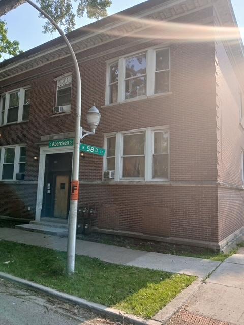 5800 S Aberdeen St, Chicago, IL 60621 - view of front facade featuring brick siding