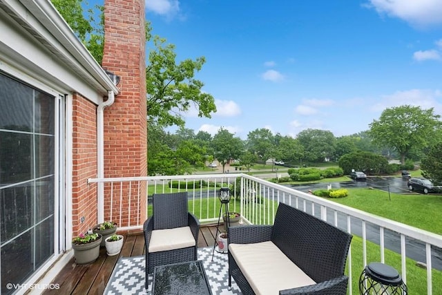 128 Carriage Way Dr Unit 217B, Burr Ridge, IL 60527 - balcony featuring view of scattered trees