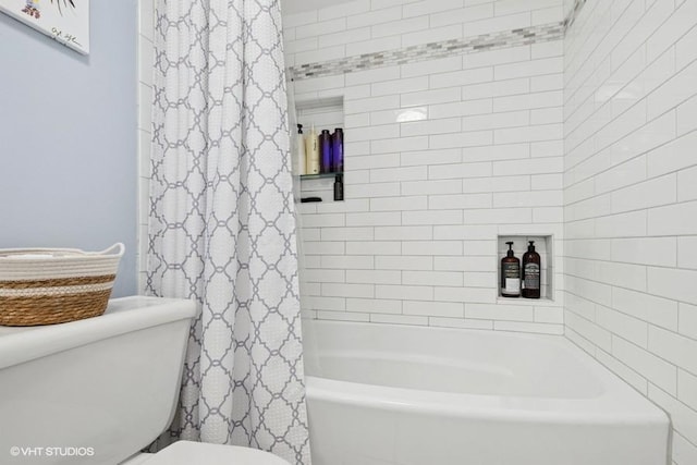 128 Carriage Way Dr Unit 217B, Burr Ridge, IL 60527 - bathroom featuring toilet and shower / bath combo with shower curtain