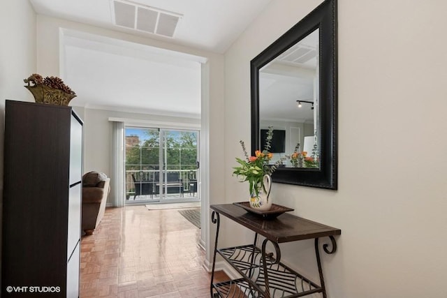 128 Carriage Way Dr Unit 217B, Burr Ridge, IL 60527 - corridor featuring ornamental molding