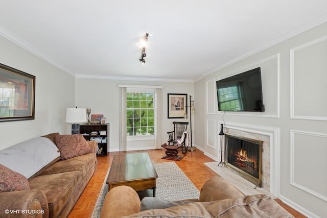 128 Carriage Way Dr Unit 217B, Burr Ridge, IL 60527 - living area featuring crown molding and a fireplace with flush hearth