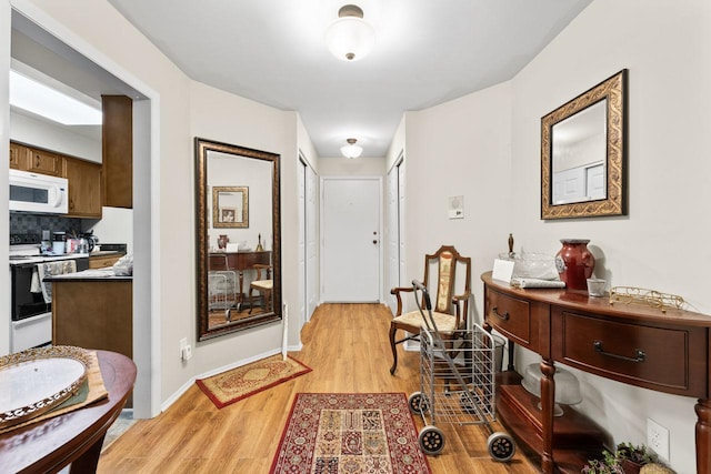 720 Saint Andrews Ln Unit 6, Crystal Lake, IL 60014 - foyer featuring light wood-type flooring and baseboards