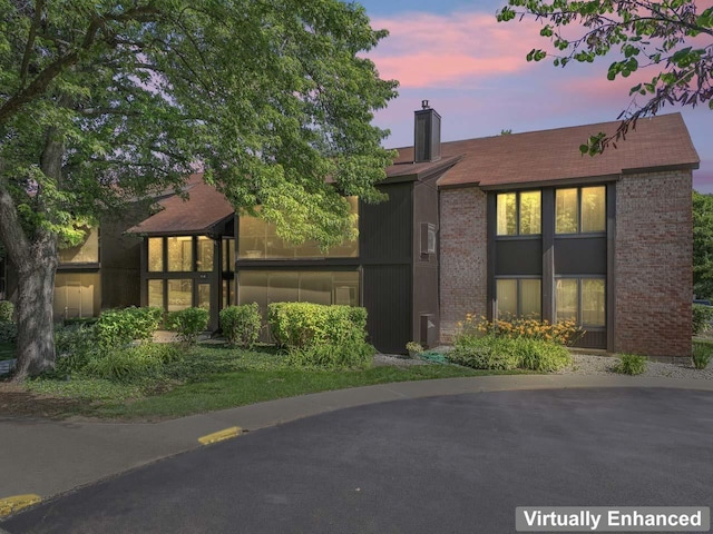 720 Saint Andrews Ln Unit 6, Crystal Lake, IL 60014 - view of front of home featuring a chimney and brick siding