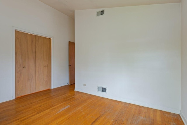 8429 Mason Ave, Morton Grove, IL 60053 - unfurnished bedroom featuring light wood-style flooring and a closet