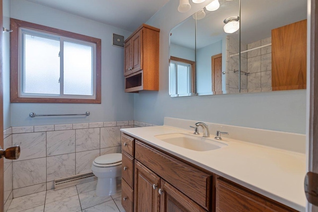 8429 Mason Ave, Morton Grove, IL 60053 - full bathroom with marble finish floors, vanity, tile walls, a tile shower, and a baseboard heating unit