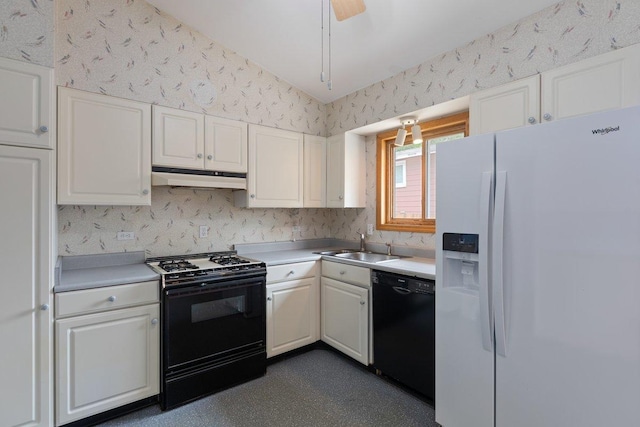 8429 Mason Ave, Morton Grove, IL 60053 - kitchen featuring black appliances, under cabinet range hood, white cabinets, light countertops, and wallpapered walls