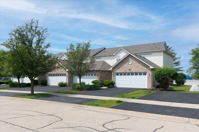 18374 Century Ct, Tinley Park, IL 60477 - view of front of home featuring brick siding and driveway