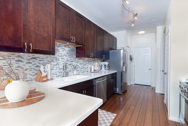 18374 Century Ct, Tinley Park, IL 60477 - kitchen with stainless steel appliances, light countertops, wood-type flooring, and backsplash