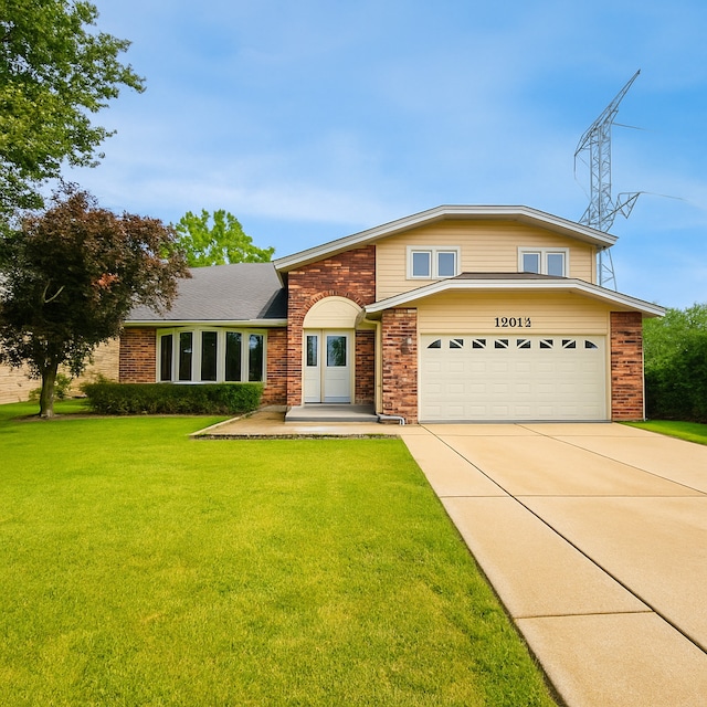 15564 S Willow Ct, Homer Glen, IL 60491 - view of front of property with concrete driveway, a garage, a front lawn, and brick siding