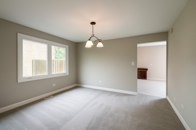 15564 S Willow Ct, Homer Glen, IL 60491 - carpeted empty room with baseboards and a chandelier