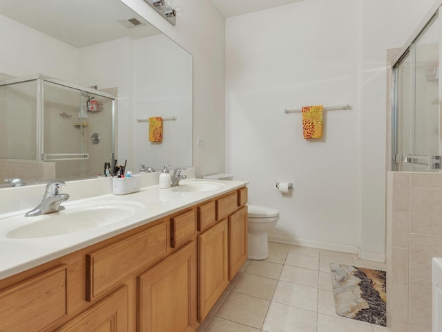 4231 Savoy Ln Unit 4231, Mchenry, IL 60050 - bathroom featuring a stall shower, tile patterned flooring, and double vanity