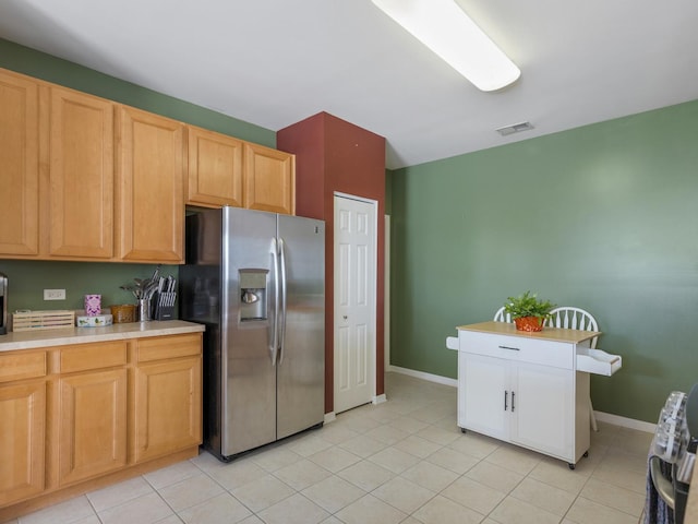 4231 Savoy Ln Unit 4231, Mchenry, IL 60050 - kitchen featuring stainless steel fridge with ice dispenser, light countertops, and light tile patterned floors