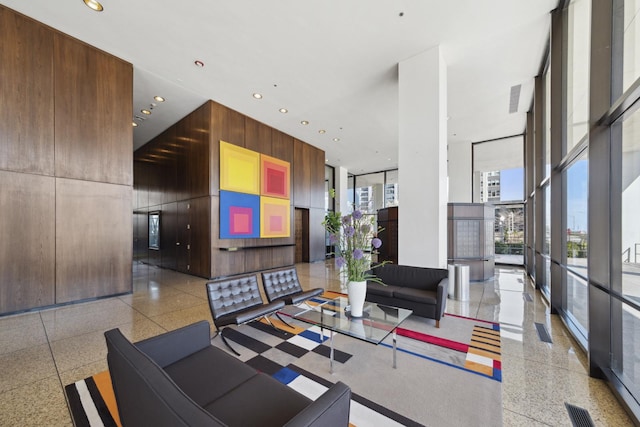 360 E Randolph St Unit 3305, Chicago, IL 60601 - building lobby with wooden walls, recessed lighting, floor to ceiling windows, and a high ceiling