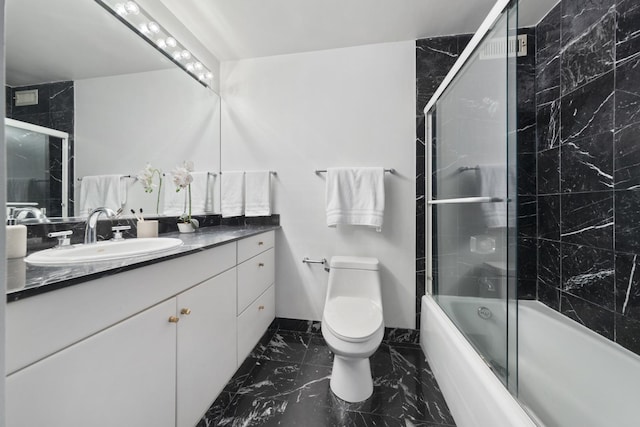360 E Randolph St Unit 3305, Chicago, IL 60601 - bathroom with vanity, marble finish floors, and combined bath / shower with glass door