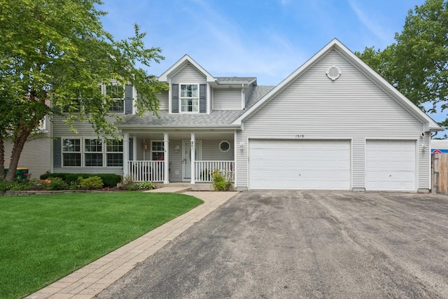 1519 Parkside Dr, Plainfield, IL 60586 - traditional-style house featuring a porch, driveway, an attached garage, a front lawn, and a shingled roof