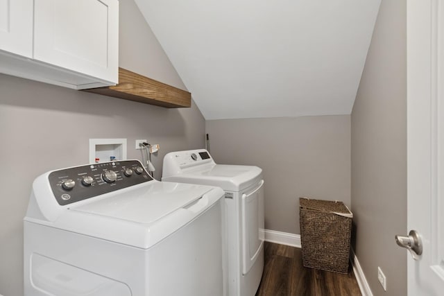 1519 Parkside Dr, Plainfield, IL 60586 - washroom with washing machine and dryer, dark wood-style flooring, and cabinet space