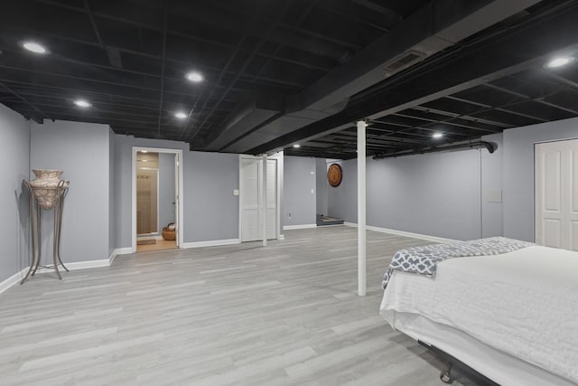 1519 Parkside Dr, Plainfield, IL 60586 - finished below grade area featuring wood finished floors and baseboards