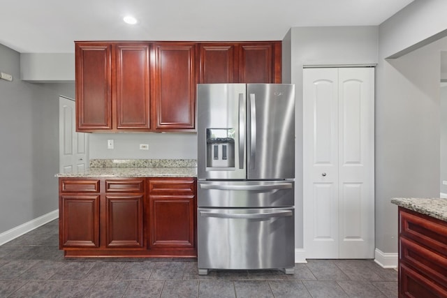 1519 Parkside Dr, Plainfield, IL 60586 - kitchen with stainless steel fridge, dark brown cabinets, light stone counters, and recessed lighting