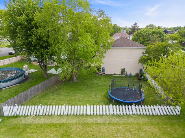 1004 Evergreen Dr, Carol Stream, IL 60188 - fenced backyard featuring a trampoline