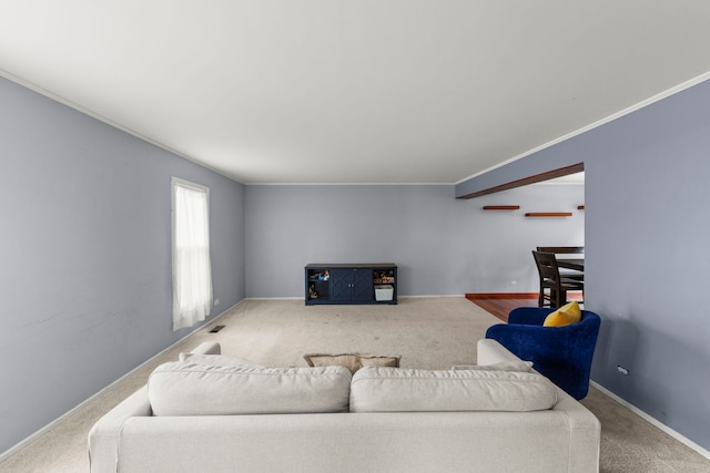 1004 Evergreen Dr, Carol Stream, IL 60188 - carpeted living area featuring crown molding and baseboards