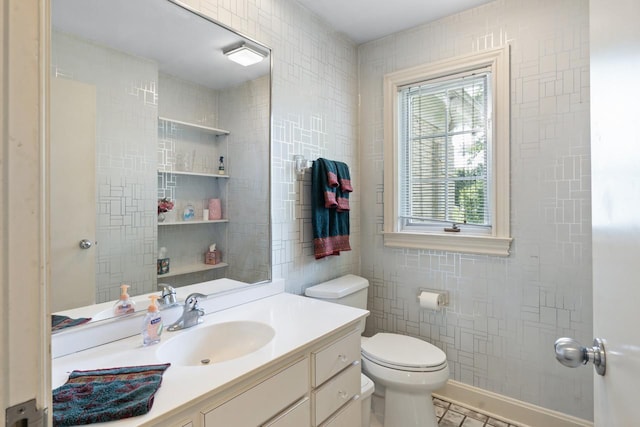 937 Braeburn Rd, Inverness, IL 60067 - bathroom with tile walls, vanity, and tile patterned floors