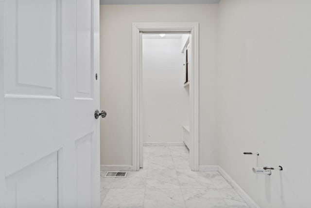 937 Braeburn Rd, Inverness, IL 60067 - corridor with light marble finish floors and baseboards