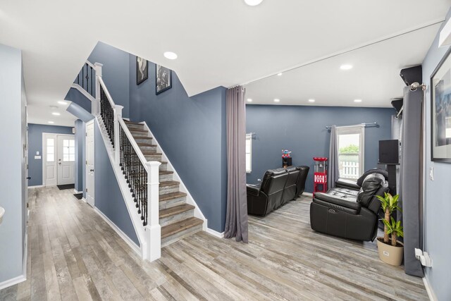 2853 Forestview Dr, Carpentersville, IL 60110 - entryway with stairs, wood finished floors, plenty of natural light, and recessed lighting