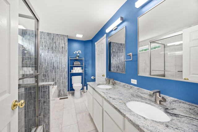 2853 Forestview Dr, Carpentersville, IL 60110 - bathroom with double vanity, tiled shower, and marble finish flooring