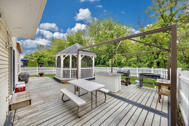 2853 Forestview Dr, Carpentersville, IL 60110 - wooden deck with a gazebo, area for grilling, and a fenced backyard