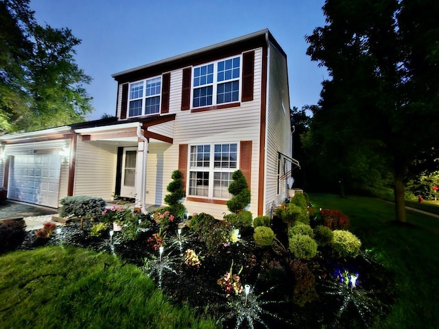 2853 Forestview Dr, Carpentersville, IL 60110 - view of front of home with an attached garage and a front yard
