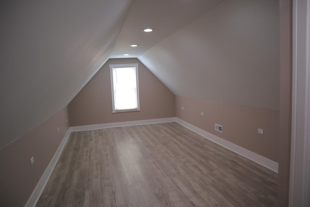 8346 S Baltimore Ave, Chicago, IL 60617 - bonus room with lofted ceiling, wood finished floors, and recessed lighting