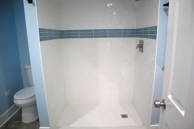 8346 S Baltimore Ave, Chicago, IL 60617 - bathroom featuring a shower stall and tile patterned flooring