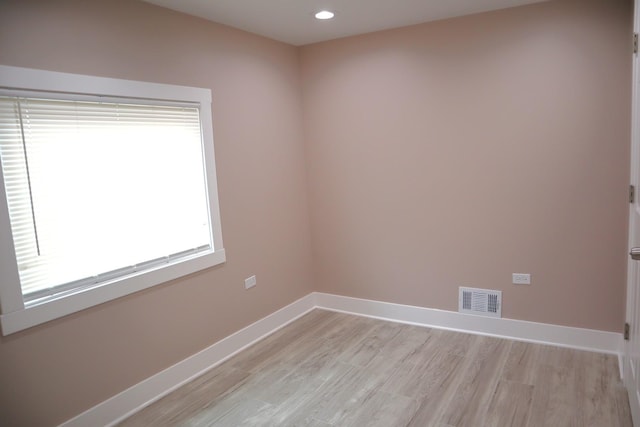 8346 S Baltimore Ave, Chicago, IL 60617 - spare room with light wood finished floors and recessed lighting