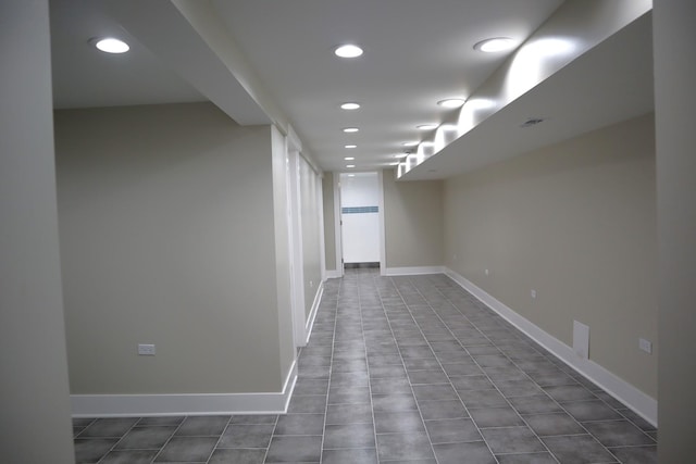 8346 S Baltimore Ave, Chicago, IL 60617 - empty room featuring recessed lighting and dark tile patterned flooring
