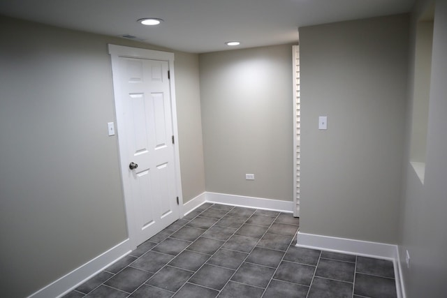 8346 S Baltimore Ave, Chicago, IL 60617 - empty room with recessed lighting and dark tile patterned floors